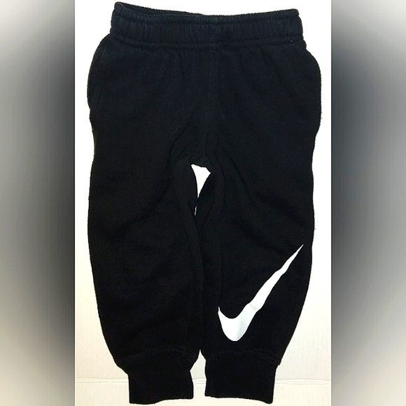 EUC Unisex NIKE Black warm Jogger pants with Large White Swoosh detail - Picture 1 of 12